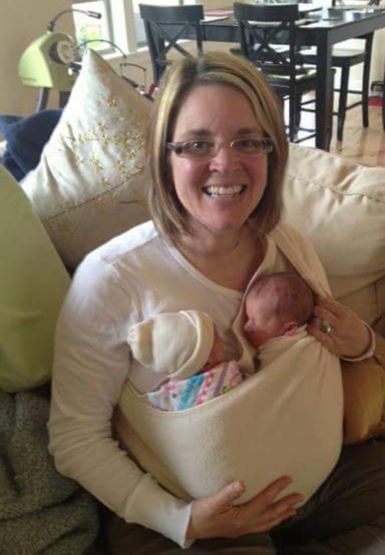 Deana Andersen-Tennant with newborn twins in carrier